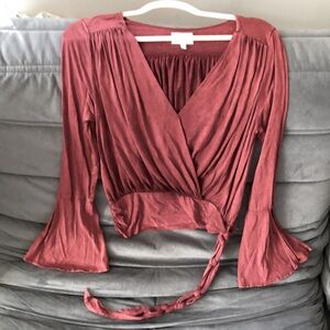 Deletta crimson colored shirt with bell sleeves